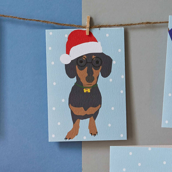 Christmas Sausage Dog Card wearing santa hat